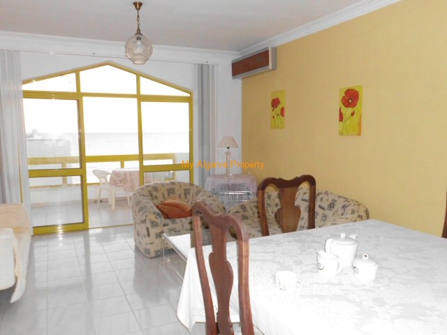 living room and balcony over the beach of quarteira